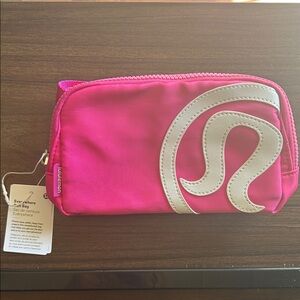 *Last Chance* lululemon athletica Hot Pink Cosmetic Pouch with White Logo